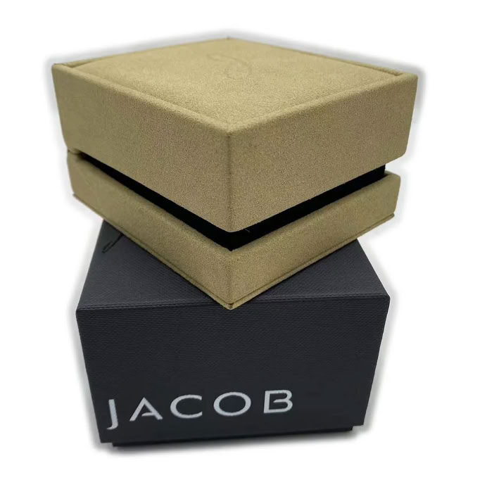 Bespoke luxury jewelry packaging box with hand-finished suede exterior and custom packer box by Swiss Packaging
